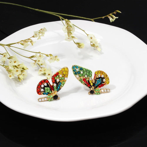 Boucles d'oreilles en forme de papillon avec des zirconiums colorés