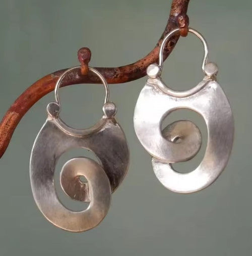 Boucles d'oreilles vintage en argent avec spirale