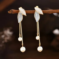 Boucles d'oreilles élégantes en forme de feuille avec perles