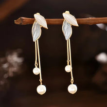 Boucles d'oreilles élégantes en forme de feuille avec perles
