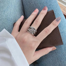 Bague ajustable en couches argentée