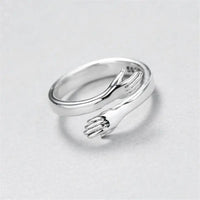 Bague ajustable type étreinte en argent