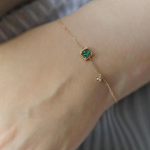 Bracelet en or avec cristal vert