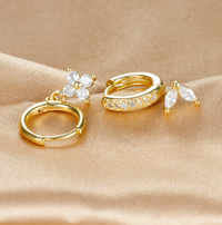 Ensemble de boucles d'oreilles avec diamants en forme de fleur