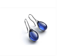 Boucles d'oreilles avec opale incrustée