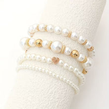 Ensemble de bracelets en perles blanches