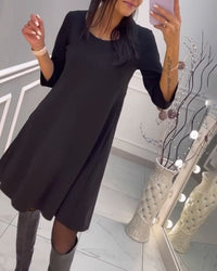 Robe unie avec nœud au dos