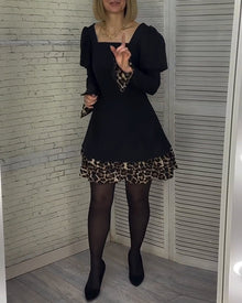Robe élégante à manches bouffantes et imprimé léopard