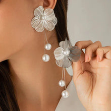 Boucles d'oreilles bohémiennes avec perles et pétales